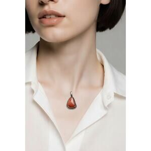 Navajo Donovan Skeets Sterling Silver Rhodochrosite Pendant